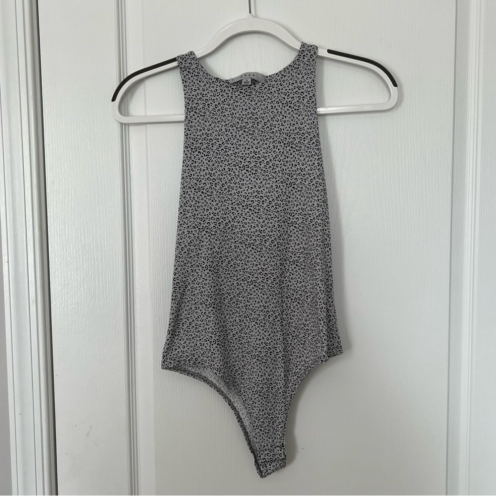 Leopard print bodysuit in a size small by Gaze for sale